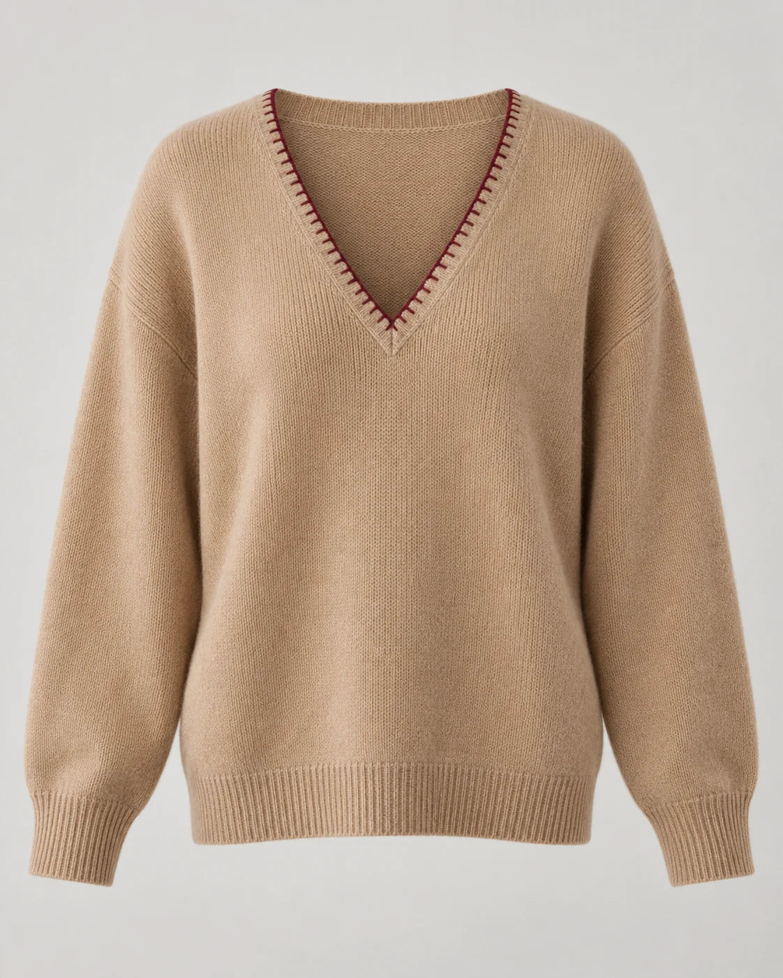 The Contour V-Neck with hand-finished blanket-stitch edging